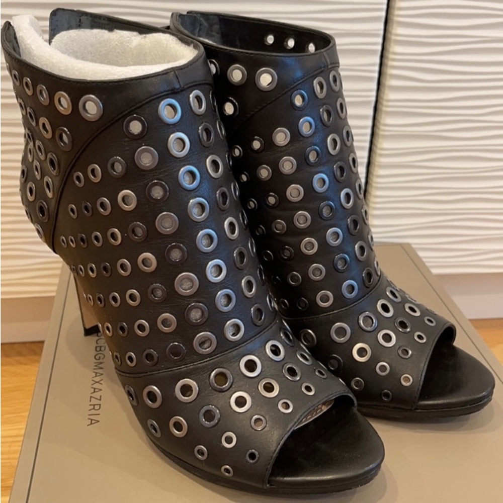 BCBGMaxAzria Black Heeled Boots with Metallic Grommets